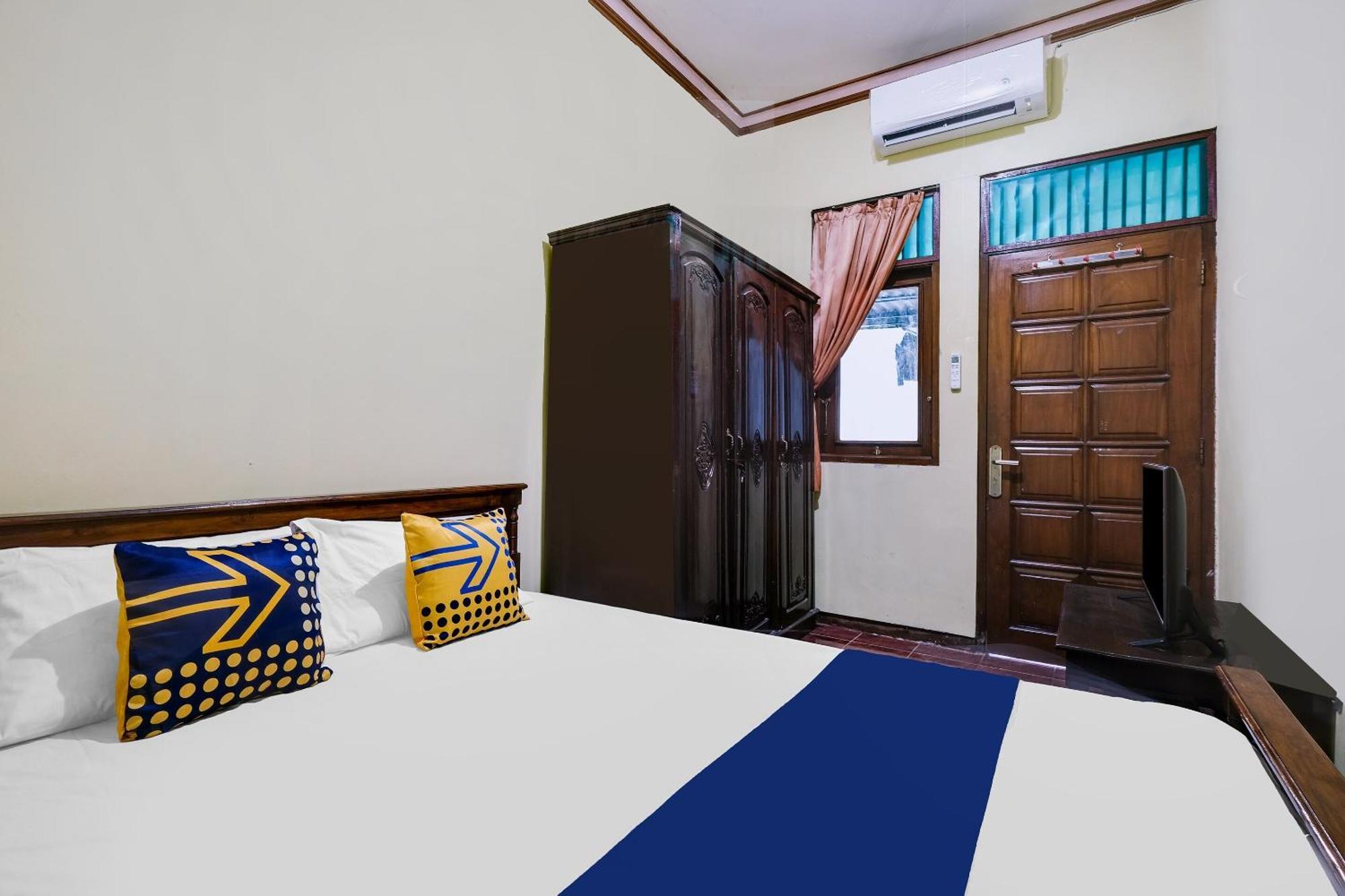 Spot On 92068 Pudja Kesuma Syariah Hotel